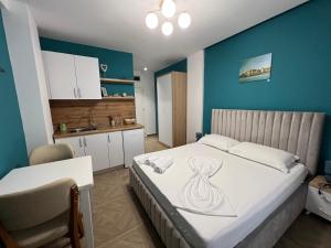 Kuchyň nebo kuchyňský kout v ubytování Hotel Luris