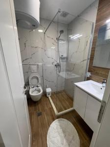Koupelna v ubytování Hotel Luris