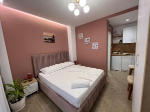 Postel nebo postele na pokoji v ubytování Hotel Luris