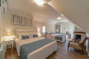 Postel nebo postele na pokoji v ubytování Hotel Monte Felice Bosque