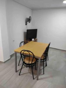 TV a/nebo společenská místnost v ubytování Casa Coletor