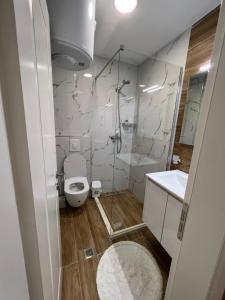 Koupelna v ubytování Hotel Luris