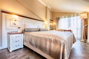 Postel nebo postele na pokoji v ubytování Dalyan Resort & Spa