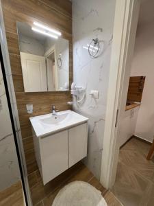 Koupelna v ubytování Hotel Luris