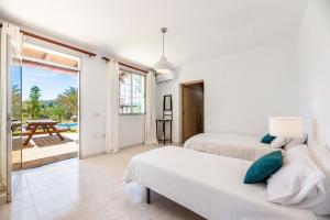 Postel nebo postele na pokoji v ubytování Villa Jazmin + 37 fotografií