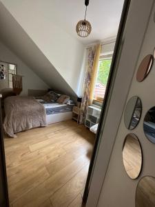 Posteľ alebo postele v izbe v ubytovaní Comfort Zone Ostroda BOHO SCANDI