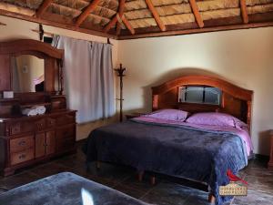 Postel nebo postele na pokoji v ubytování Bungalows Cabo Pulmo