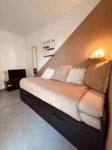 Łóżko lub łóżka w pokoju w obiekcie Urban Oasis Blancarde