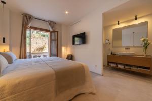 Postel nebo postele na pokoji v ubytování Nema Boutique Hotel & Spa
