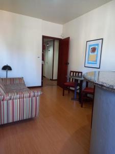 Uma área de estar em Cheverny Apart Hotel