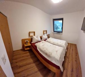 Un pat sau paturi într-o cameră la Ottohof - Morgenrot