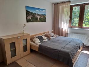 Posteľ alebo postele v izbe v ubytovaní Penzion Na Pohoři