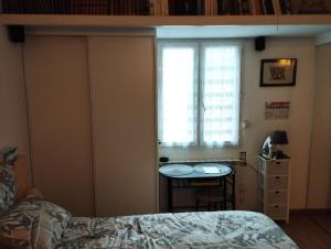Posteľ alebo postele v izbe v ubytovaní chambre d'hote dans maison individuelle