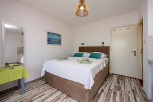 Posteľ alebo postele v izbe v ubytovaní Studio Crikvenica 6