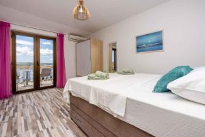 Posteľ alebo postele v izbe v ubytovaní Studio Crikvenica 6
