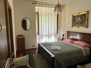 A bed or beds in a room at VILLA OLGA