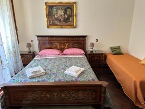 A bed or beds in a room at VILLA OLGA