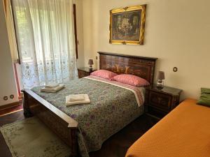 A bed or beds in a room at VILLA OLGA