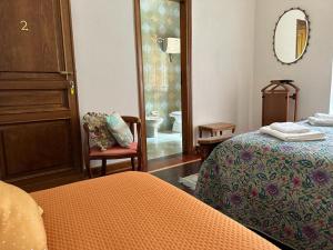 A bed or beds in a room at VILLA OLGA