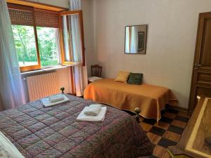 A bed or beds in a room at VILLA OLGA
