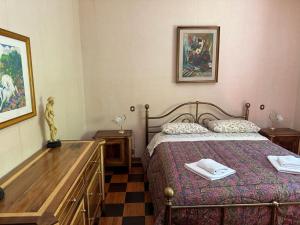 A bed or beds in a room at VILLA OLGA