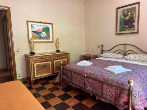 A bed or beds in a room at VILLA OLGA