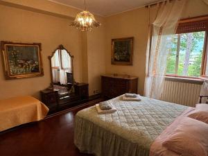 A bed or beds in a room at VILLA OLGA