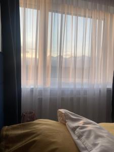 Posteľ alebo postele v izbe v ubytovaní The Gatsby Apartment