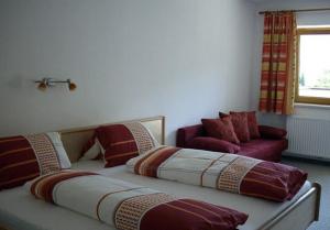 Posteľ alebo postele v izbe v ubytovaní Ferienhaus Zillertal