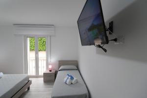 Postel nebo postele na pokoji v ubytování BED & BREAKFAST VAL di ERICE