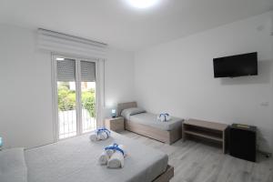 TV a/nebo společenská místnost v ubytování BED & BREAKFAST VAL di ERICE