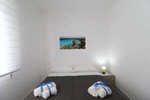 Postel nebo postele na pokoji v ubytování BED & BREAKFAST VAL di ERICE