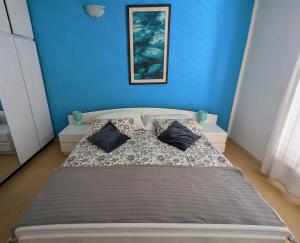 A bed or beds in a room at Apartment Marica