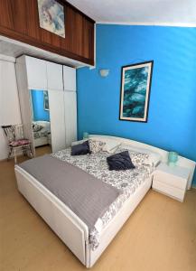 A bed or beds in a room at Apartment Marica