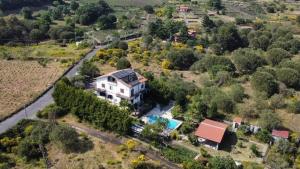 an aerial view of a house with a yard at Etna Petit Relais in Nicolosi