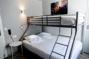 Cama o camas de una habitación en Hotel Bristol