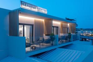 an architectural rendering of an apartment building at night at Akrogiali Luxury View in Laganas