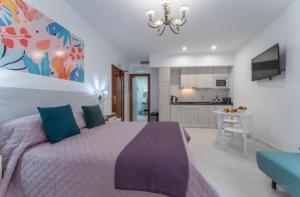 Posteľ alebo postele v izbe v ubytovaní Villa Augusto Cosy Romance