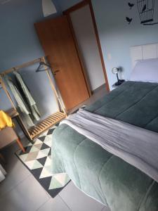 מיטה או מיטות בחדר ב-Cantin da Mata
