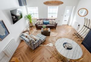 Posezení v ubytování Boutique Old Sea Stable - 1 minute from beach