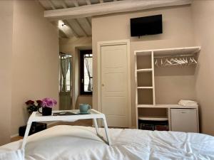 Postel nebo postele na pokoji v ubytování B&B La Fenice