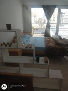 Ένα ή περισσότερα κρεβάτια σε δωμάτιο στο Sea&Whales +10 φωτογραφίες