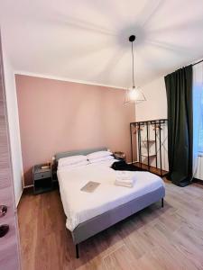 Postel nebo postele na pokoji v ubytování A Pisa con amore + 26 fotografií