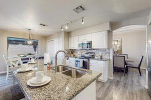 a kitchen with a sink and a counter top at Lemmon Vista in Oro Valley