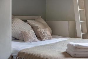 Katil atau katil-katil dalam bilik di Cosy Apartment near The London Eye