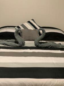 Uma cama ou camas num quarto em Hermoso departamento en Coyoacán