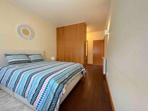 Кровать или кровати в номере Canidelo Modern Apartment