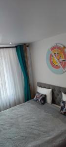 Katil atau katil-katil dalam bilik di Cosy Apartment in City Center