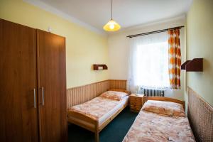 Postel nebo postele na pokoji v ubytování Ubytování u Nováků