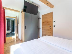 Łóżko lub łóżka w pokoju w obiekcie AlmApARTment Mauterndorf Pichl 8-2
